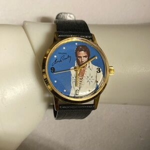 Vintage Boxcar Elvis Presley wind up watch . Gold tone 33mm blue dial 1977